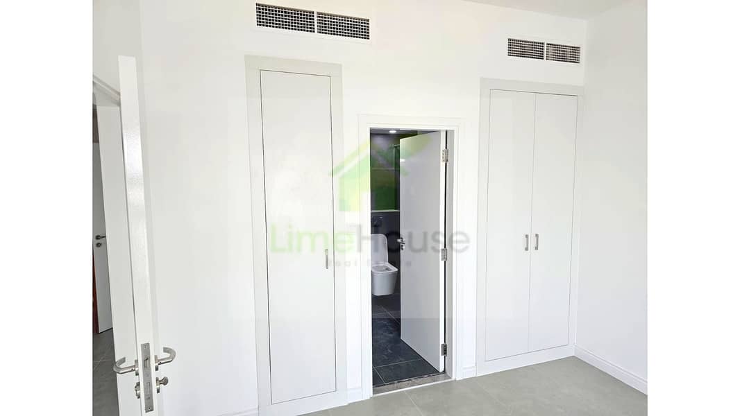 14 17-al-arta-4-greens-dubai-bedroom-wardrobes-ensuite-bathroom-1br-apartment-rent. jpg