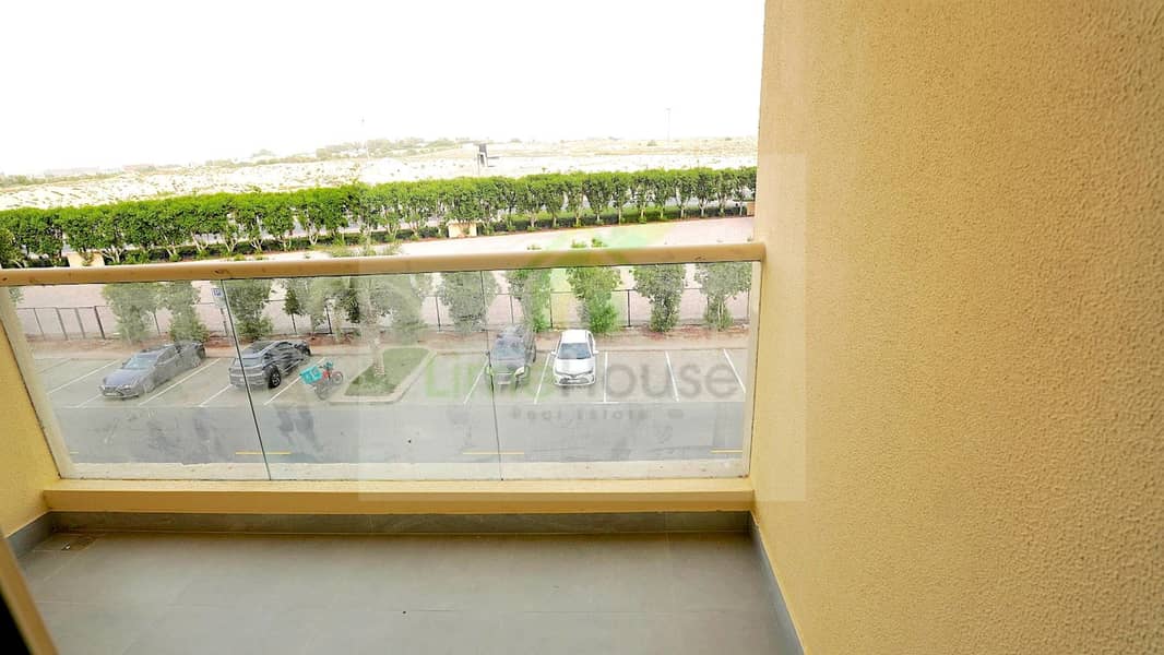 17 25-al-arta-4-greens-dubai-balcony-greens-community-view-1br-apartment-rent. jpg