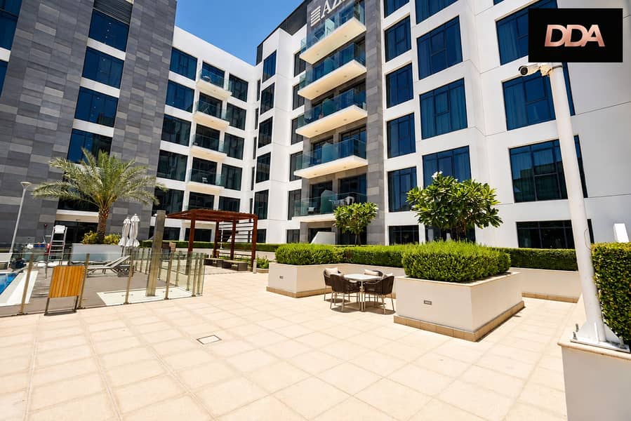 10 azizi-greenfield-1-bedroom-apartment-building-exterior-01. png