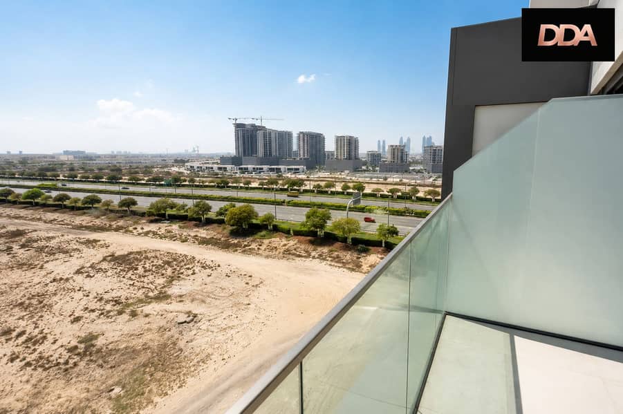 14 azizi-greenfield-1-bedroom-apartment-balcony-view. png