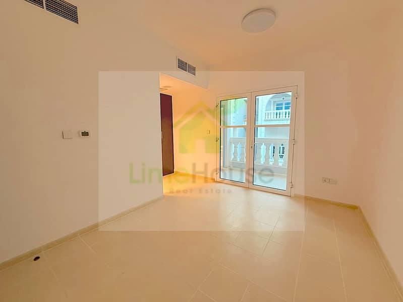 15 seasons-community-jvc-townhouse-upper-bedroom-balcony-doors-open-layout. jpg
