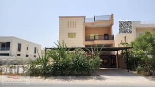 Villa for sale in Ajman, Al Muwaihat area. 5 master bedrooms with a roof terrace, majlis, living room, and maid's room. Freehold ownership available t