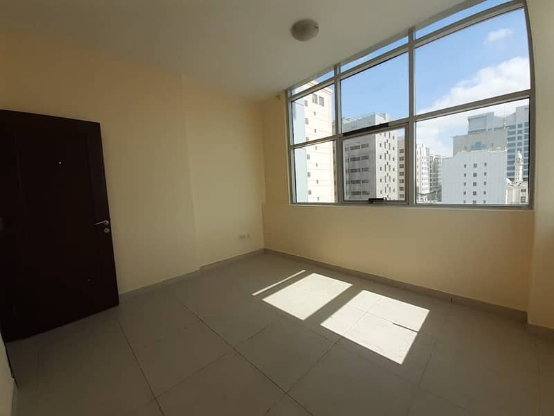 ''Owesome 2 Bedrooms Flat With Wardrobes and Balcony in Shabiya''