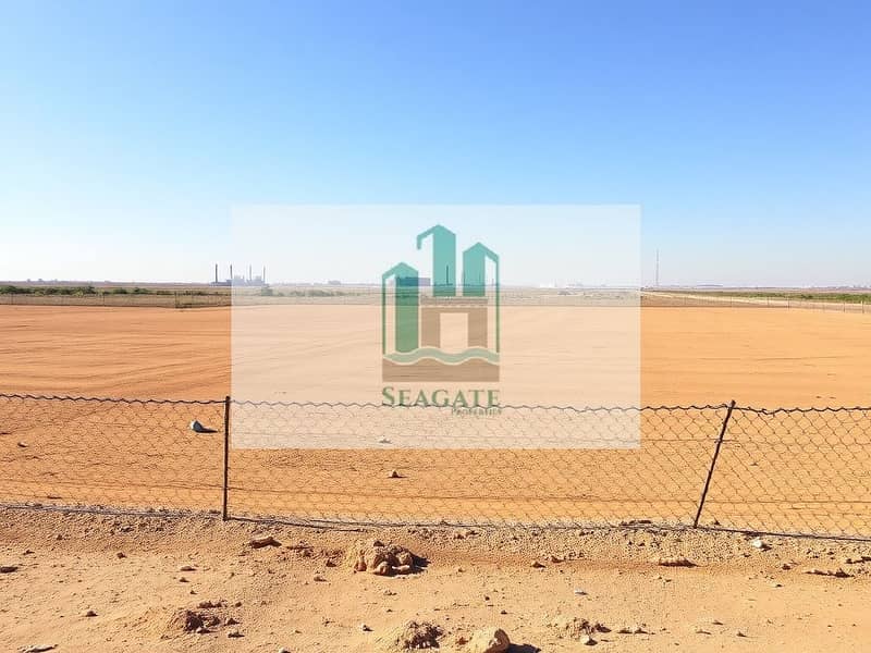 3 A_vast_empty_industrial_plot_with_flat_dry_land_under_a_clear_sky. _The_ground_is_a_mix_of_sandy_brown_and_clay_devoid_of_any_vegetation_or_structures. _A_simple_chain_link_fence_surrounds_the_perimeter_emphasizing_the. jpeg