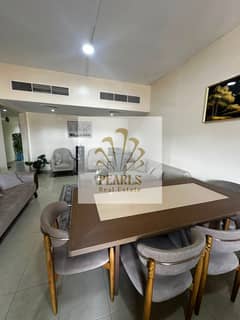 Furnished 2BR in Horizon Towers with open-view balcony, free parking, spacious layout, close to Ajman Corniche and all services.