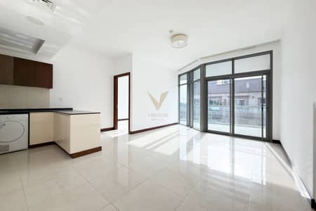 1 Bedroom Apartment for Rent in Jumeirah Village Circle (JVC), Dubai - SPACIOUS 1BR | SEMI-CLOSED KITCHEN | FULLY FITTED