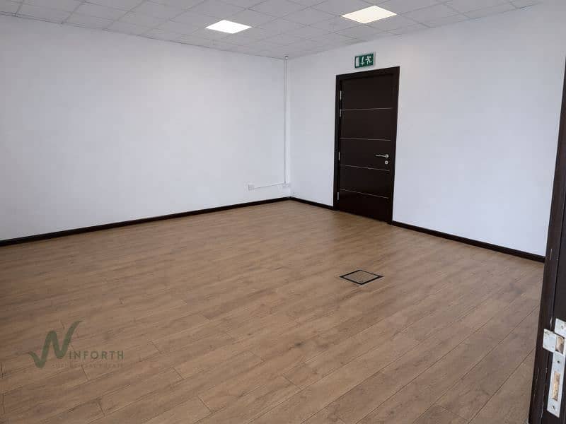 3 Empty office with emergency exit sign. png