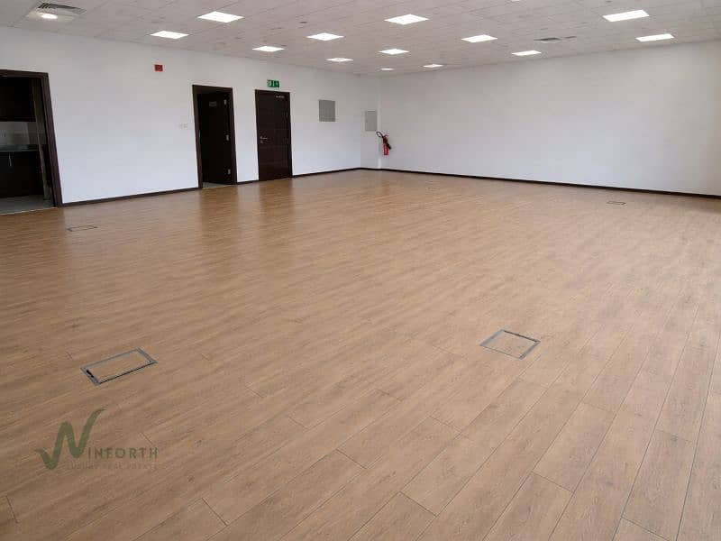 8 Spacious office with light oak flooring. png