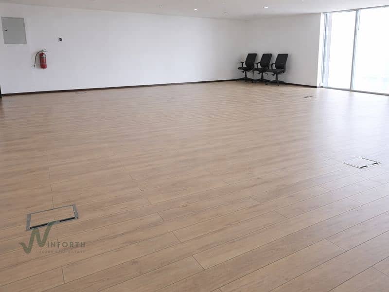 10 Empty office with oak flooring. png