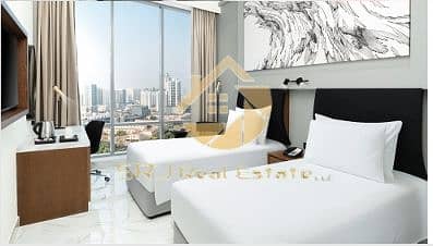 Hotel Apartment zum zum Verkauf in Jumeirah Village Circle (JVC), Dubai - AVALON3. png