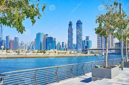 1 Bedroom Apartment for Rent in Business Bay, Dubai - business-bay-skyline-dubai-water-canal-embankment-march-uae-promenade-opens-view-elegant-modern-jw-marriot-263258927. webp 1 Bedroom Apartment for Rent in Business Bay, Dubai - business-bay-skyline-dubai-water-canal-embankment-march-uae-promenade-opens-view-elegant-modern-jw-marriot-263258927. webp