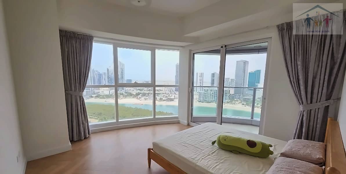 3 marina-bay-bedroom-sea-view-02. jpg