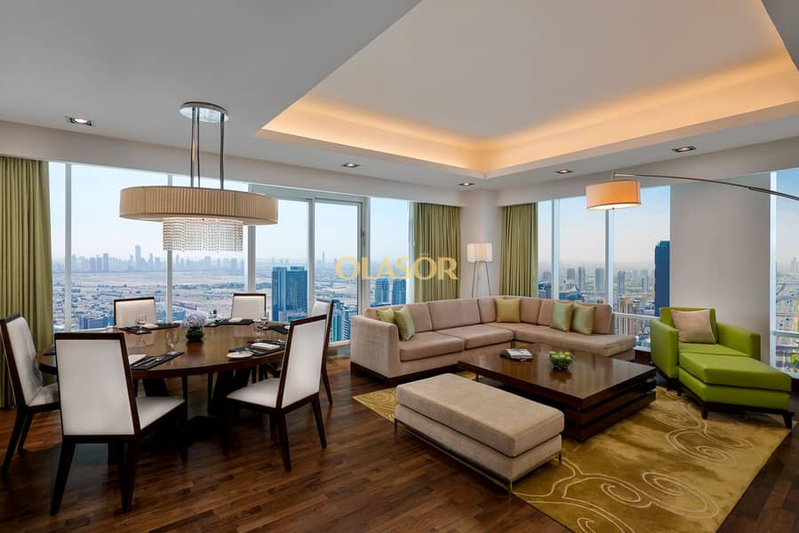 2 Deluxe Three Bedroom Penthouse_Dining & Living Room. jpg