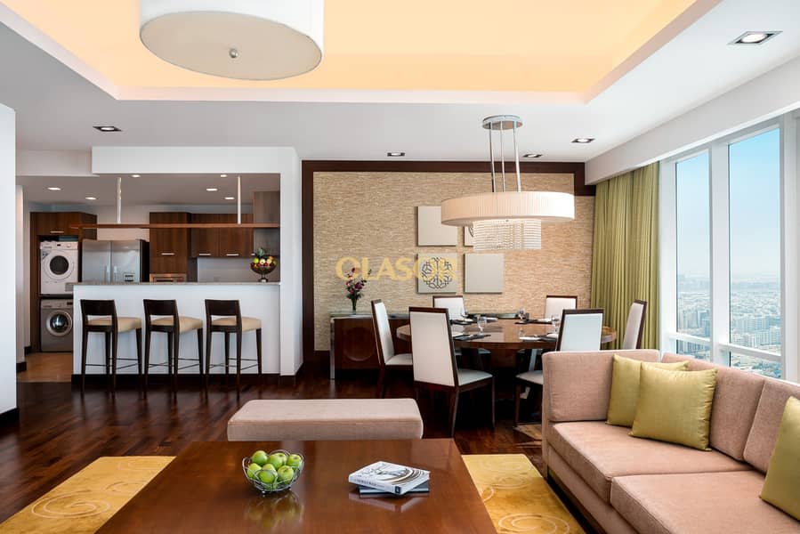 4 Deluxe Three Bedroom Penthouse_Dining & Living Room_1. jpg