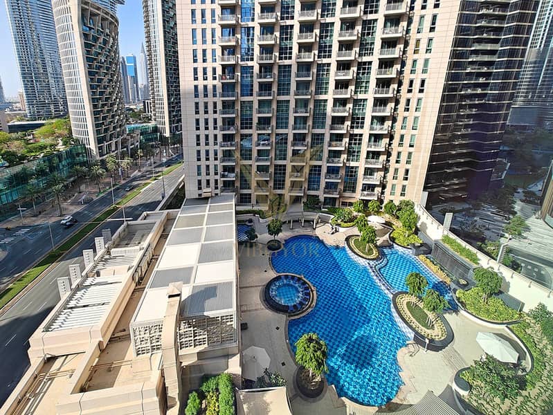 Vacant 1BR Apartment | Pool - Boulevard View Vacant 1BR Apartment | Pool - Boulevard View