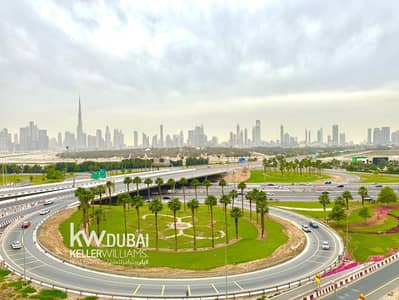 Studio for Rent in Dubai Healthcare City Phase 2, Dubai - Burj Khalifa Balcony View | Furnished