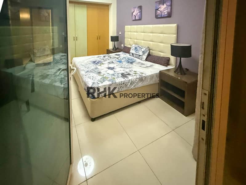 8 Furnished master bedroom balcony view Suburbia B Jebel Ali Dubai apartment