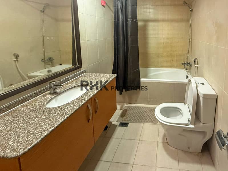11 Master ensuite full-size bathtub granite countertop Suburbia Jebel Ali Dubai