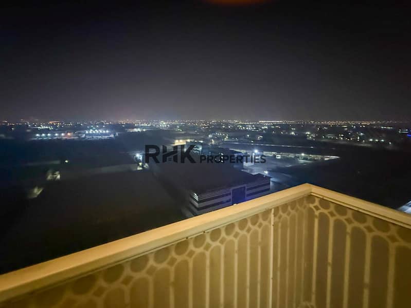 13 High-floor balcony night view Suburbia B Jebel Ali residential tower Dubai