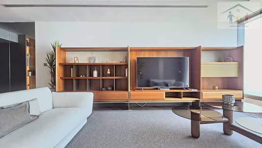Appartement de 2 chambres à à louer à Al Reem Island, Abu Dhabi - sun-02-living-room-media-wall. jpg