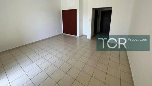 Studio for Rent in International City, Dubai - Spain Cluster | With Balcony | International City