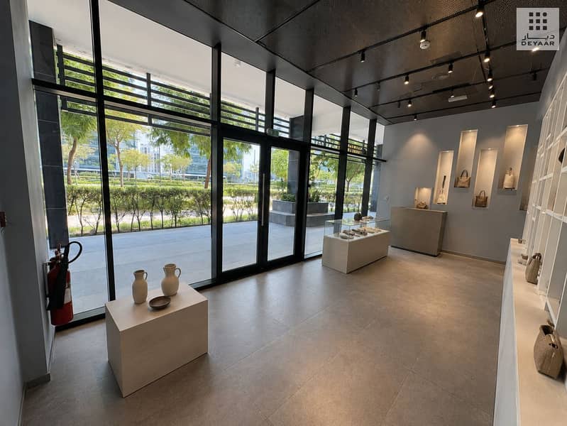 4 03_Shop_10_Lightly_Staged_Showroom_View. png
