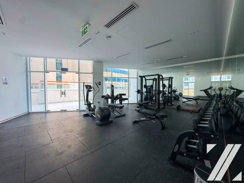 23 ORP451217-studio-apartment-millennium-binghatti-residences-business-bay-gym-treadmills. webp. jpg