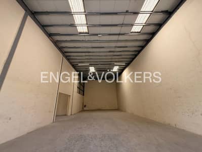Warehouse for Rent in Dubai Investments Park (DIP), Dubai - High-Clearance | Shutter Access | Clean Activity Warehouse for Rent in Dubai Investments Park (DIP), Dubai - High-Clearance | Shutter Access | Clean Activity
