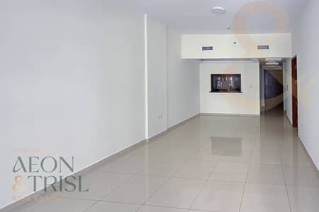 1 Bedroom Flat for Sale in Jumeirah Village Circle (JVC), Dubai - Enclosed Kitchen | Maid's room | Spacious balcony