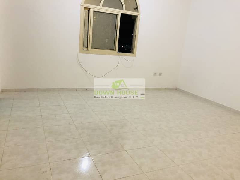 Huge studio flat with private parking for rent in al mushrif behind mushrif mall .