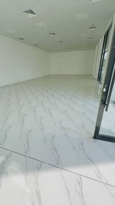Shop in affitto a Al Zorah, Ajman - Al Zorah Building Shop B-2. jpeg Shop in affitto a Al Zorah, Ajman - Al Zorah Building Shop B-2. jpeg