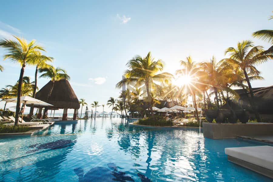 13 swimming-pool-among-palm-trees-on-a-tropical-islan-2022-02-12-05-47-40-utc. jpg