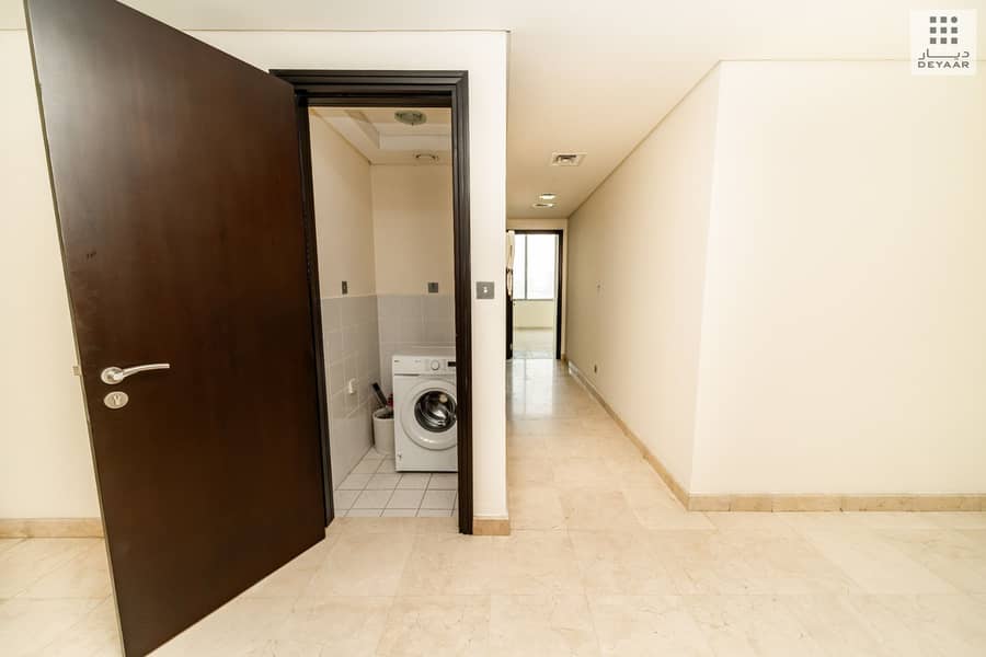 8 14-Sky Gardens-BIN 4840-1510-Laundry Room. jpg