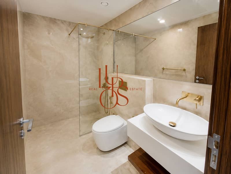 11 Apartment_05_Bathroom_Walk_In_Shower. jpg