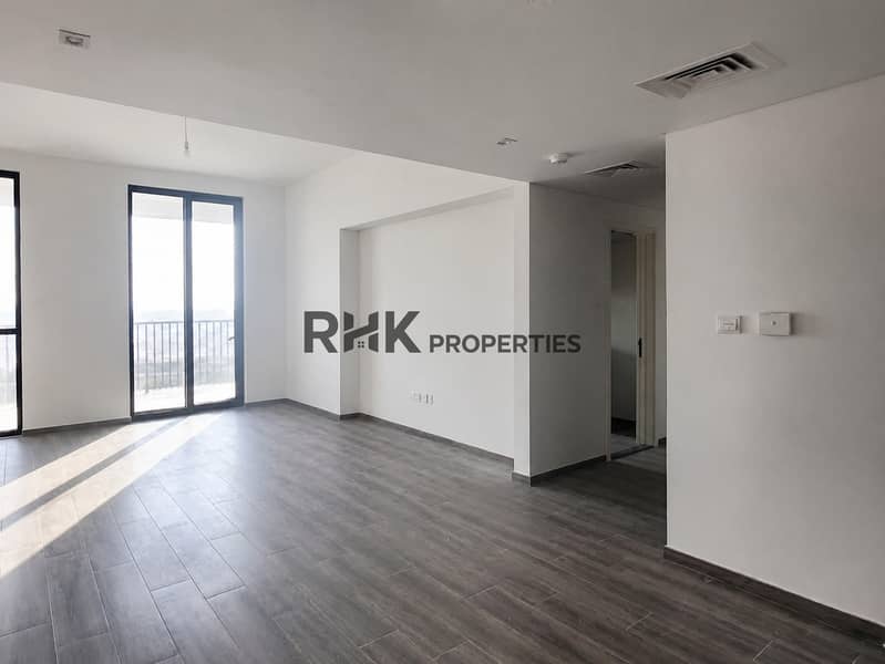3 Sunlit living and dining area in a Noor 5 two-bedroom apartment