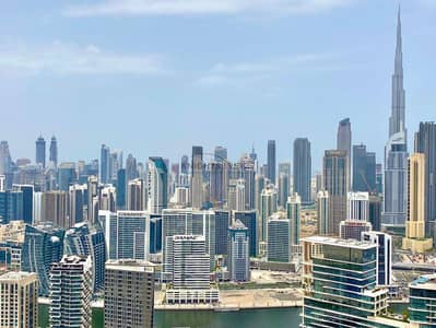 فلیٹ 1 غرفة نوم للايجار في الخليج التجاري، دبي - شقة في برج B،أبراج داماك من باراماونت للفنادق والمنتجعات،الخليج التجاري 1 غرفة 100000 درهم - 16273047