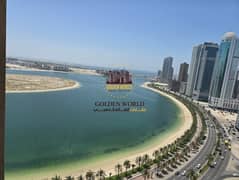 Luxury 2 Master BHK in Sharjah with Qasba view! Features 3 baths, balcony & built-in wardrobes. FREE AC, parking, gym & pool. Flexible payment in 4 or