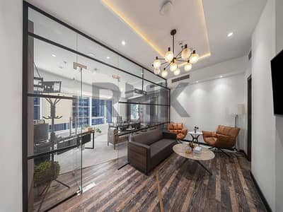 Office zum zur Miete in Business Bay, Dubai - Fitted office lounge with glass partition, chandelier and city view in JLT Dubai