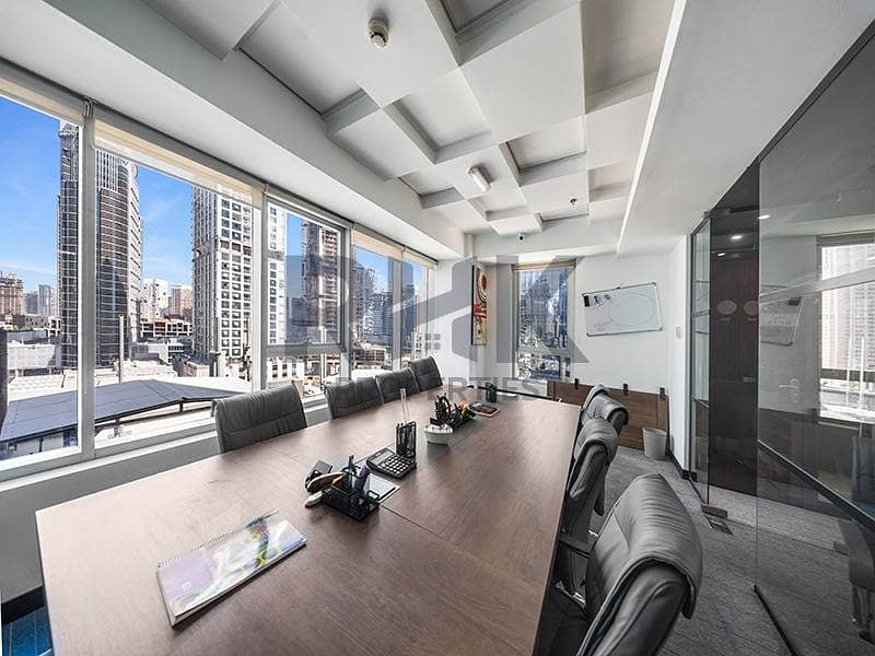13 Bright meeting room with large conference table and skyline views in JLT Dubai