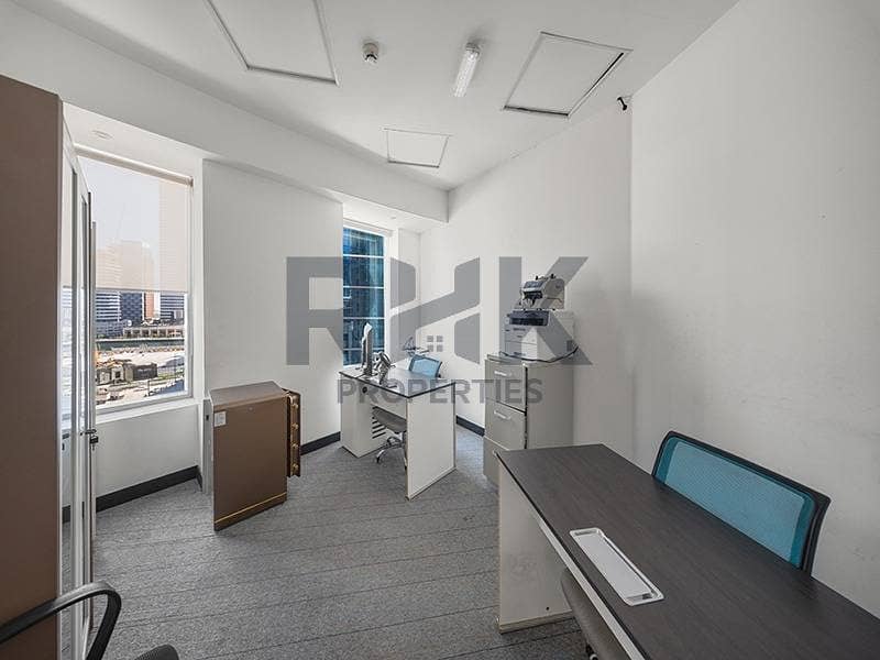 16 Small private office room with desk, safe and tower view in JLT Dubai