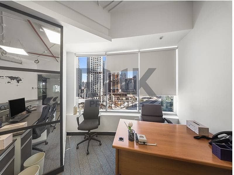 23 Private office cabin with executive desk and Marina skyline view in Dubai