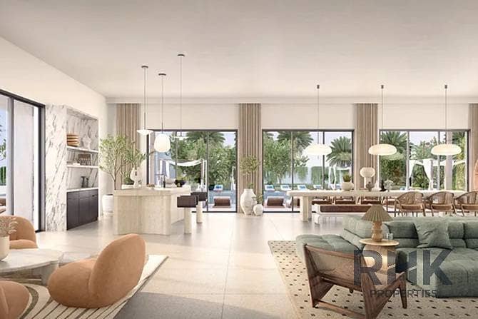 2 Rivana townhouse open-plan living dining kitchen with garden views at The Valley Dubai