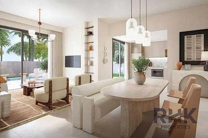 3 Bright living and dining area with pool view in Rivana townhouse at The Valley by Emaar