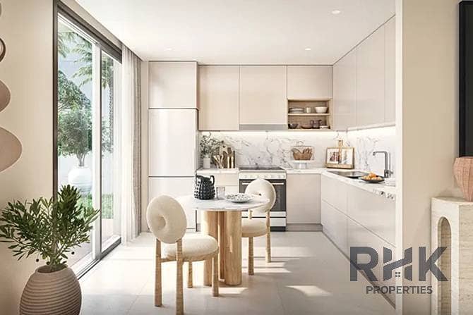 5 Modern fitted kitchen with breakfast nook in Rivana townhouse The Valley Dubai