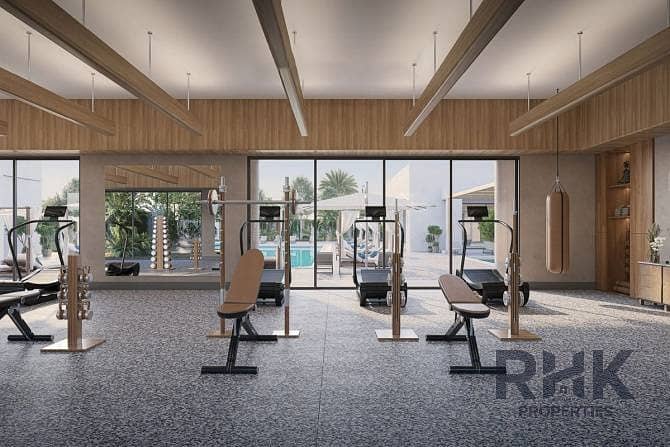 6 Fully equipped community gym with pool views at Rivana The Valley Dubai