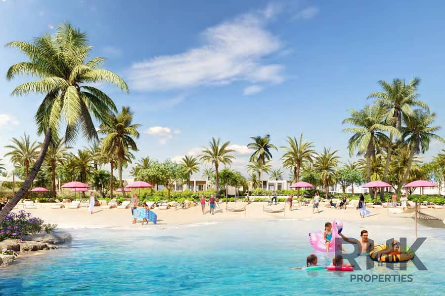 9 Crystal lagoon beach with families swimming at The Valley by Emaar Dubai