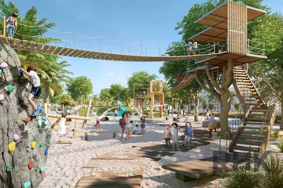 15 Children's adventure playground with rope bridge and climbing wall at The Valley Dubai