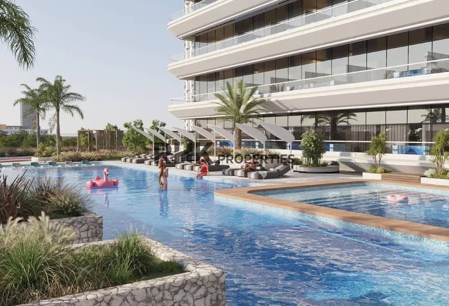 7 Infinity swimming pool with sunbeds and tropical landscaping at upscale Dubai residential community