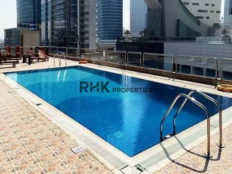 2 Rooftop swimming pool at Ontario Tower Business Bay with Dubai skyline views