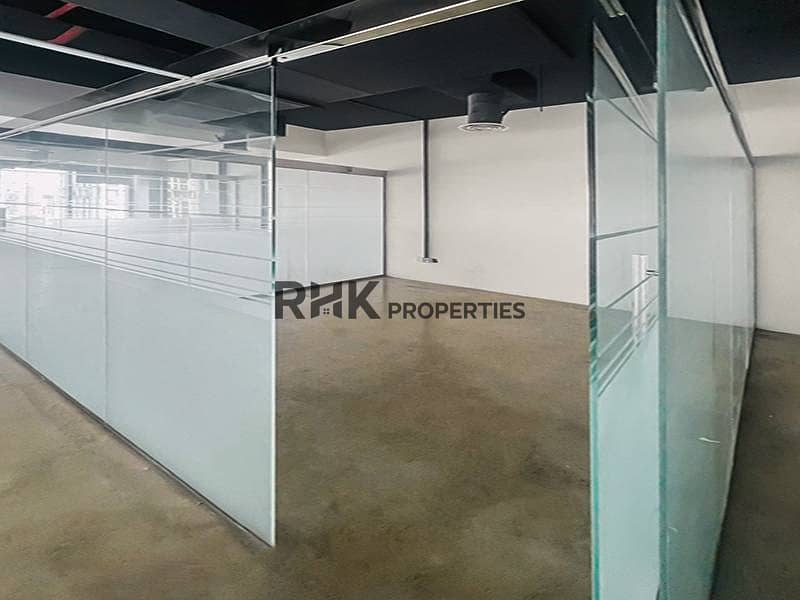 7 Open plan office in Ontario Tower Business Bay with frosted glass partitions
